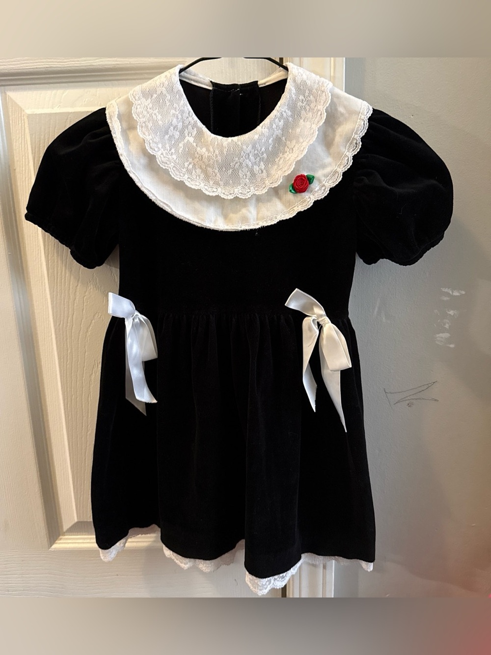 Classic Black Velvet Girls Dress with White Lace Collar and Red Rose Accent